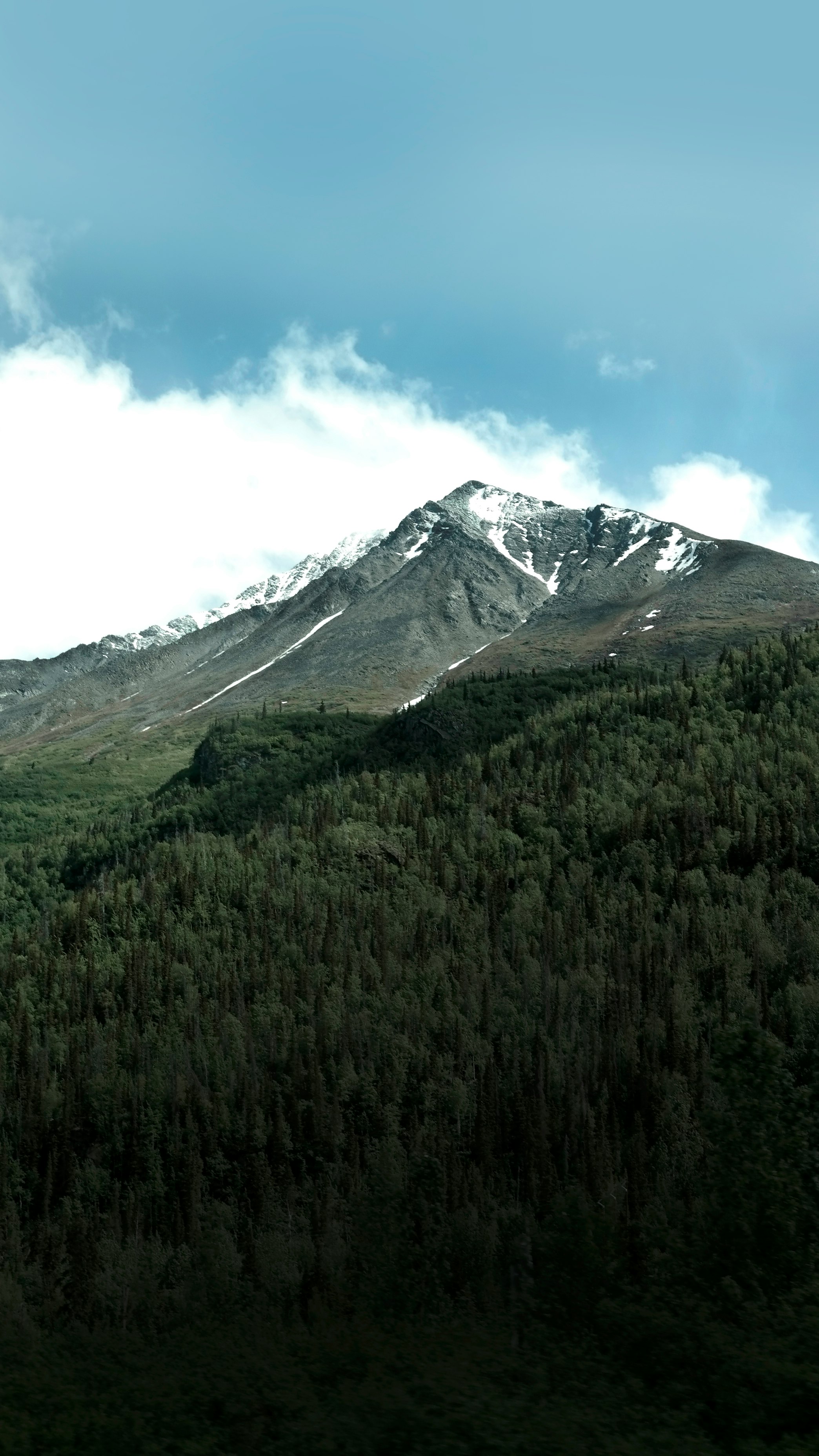 snowy mountain under blue sky